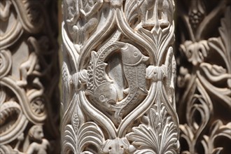 Sculpted Christian fish symbols in the medieval columns of the cloisters of Monreale Cathedral