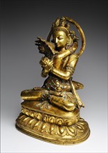 Old tantric Buddha sculpture in a mystical union with the wisdom partner