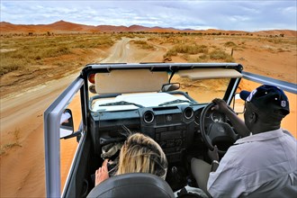 In Safari car on the dunes of the Sossusvlei