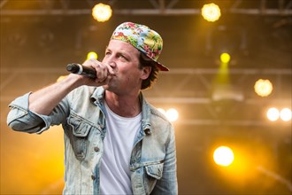 The German rapper Dendemann performing live at Heitere Open Air