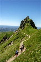 Hikers on way in the Massif of Sancy