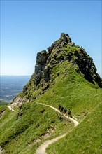 Hikers on way in the Massif of Sancy