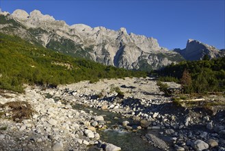Theth or Thethi River in front of the Albanian Alps