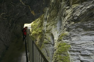 Tourist looking down into the Viamala gorge near Thusis