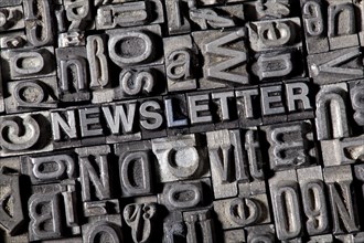 Old lead letters forming the word NEWSLETTER
