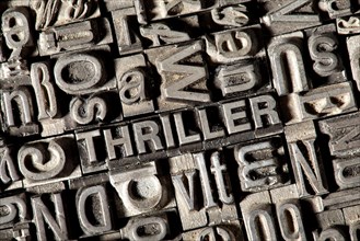 Old lead letters forming the word THRILLER