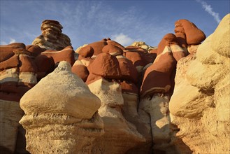 Eroded hoodoos and rock formations discolored by minerals