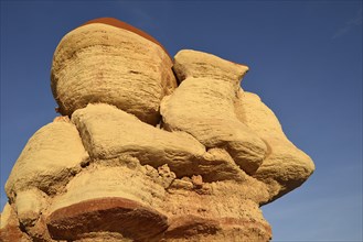 Eroded hoodoos and rock formations discolored by minerals