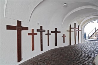 Crosses of thanks in the entrance to the inner courtyard