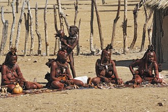 Women selling souvenirs in a Himba village