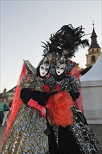 People in Baroque costumes