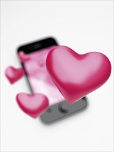 An IPhone with hearts