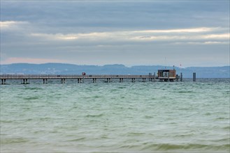 The pier at sunrise in Altnau on Lake Constance