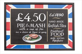 A pub sign advertising traditional British food
