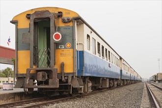 State railway train at station in Thailand