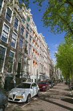 Historic buildings beside Keizersgracht canal in Amsterdam