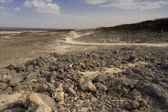 Newly built salt road leading through the landscape shaped by flood basalts near Afdera