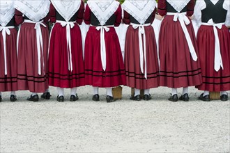 Women in traditional Bavarian costume forming a guard of honour for the entrance into the beer tent