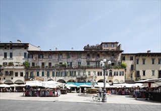 Case dei Mazzanti building with mural paintings and the Madonna Verona fountain