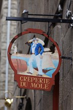 Hanging sign of a creperie