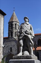 War memorial and church in the village of Saugues