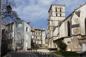 Saint Andre Church and mural Memoires du XXeme Siecle by Yslaire