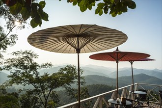 Parasols on cafe terrace with a view