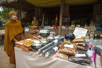 Monk at a market stall
