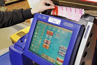 Camelot National Lottery Terminal in a shop