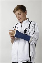 Young athlete with an arm injury