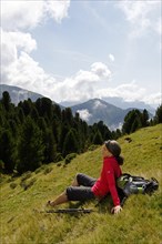 Hiker at the Raschotz or Rasciesa mountain pasture