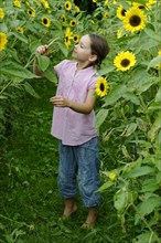 Girl in a sunflower field