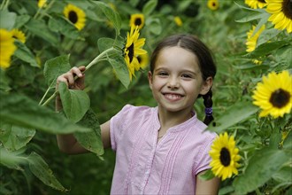 Girl in a sunflower field