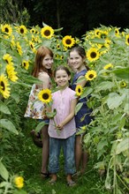 Girls in a sunflower field
