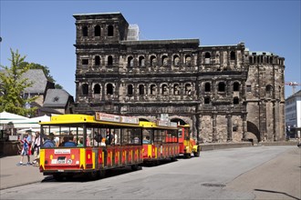 Roemer Express' sightseeing train in front of the Porta Nigra