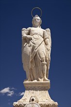 Statue of Archangel Raphael on the Roman bridge Ponte Romano