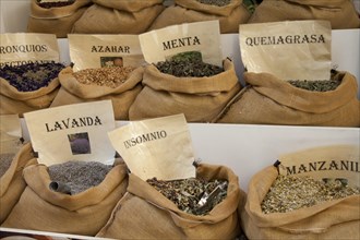 Small bags of tea at a market stall