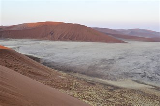 View from Dune 45 on a desert landscape with dunes at dawn