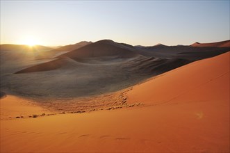 Sunrise view from Dune 45 on a desert landscape with dunes