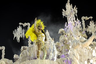 Female Samba dancer on an allegorical float of the samba school Unidos da Tijuca