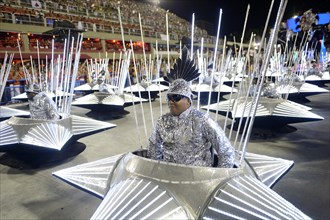 Wheelchair users take part in the parade of the samba school Inocentes de Belford Rocho