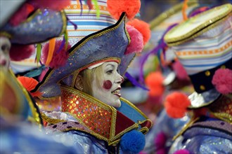 Woman dressed as clown at the parade of the samba school Academicos do Salgueiro