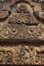 Bas-relief on doorway of Khmer Hindu temple