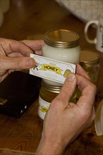 Labelling up a pot of borage honey