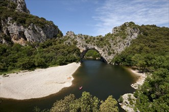 View of river and limestone arch