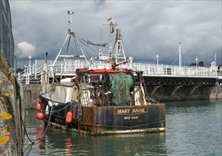 Fishing boat moored in harbour