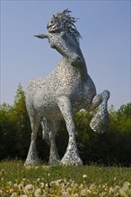 Metal sculpture of Gypsy Cob horse installed on roundabout