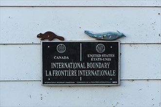 Sign at the border between Canada and the United States of America
