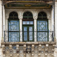 Windows of an old Greek house hotel
