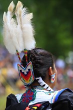 Woman in traditional dress at the Pow Wow Festival